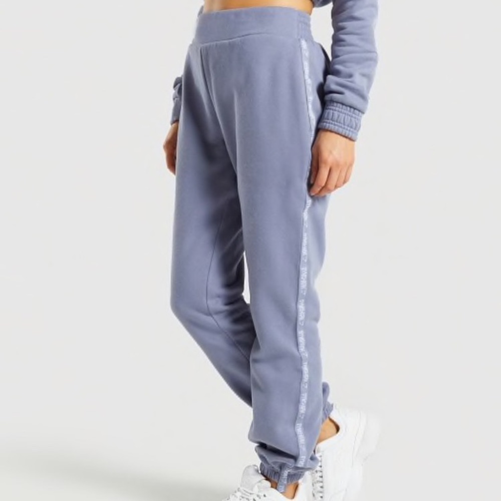 steel blue gymshark joggers w logo on legs!
